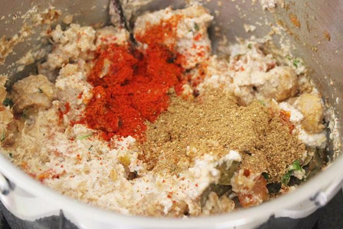 addition of spice powders to make soya chunks kurma