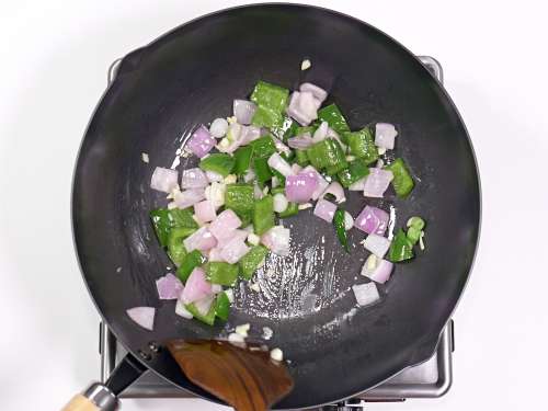 saute onions and bell peppers for chili chicken
