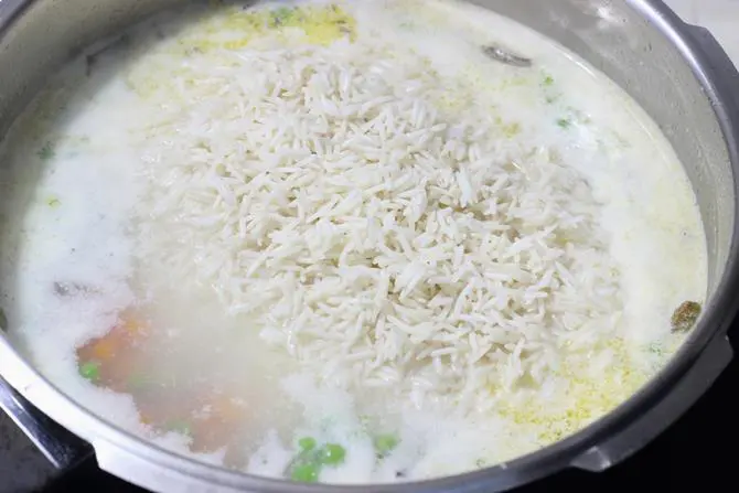 addition of soaked rice for coconut milk rice recipe
