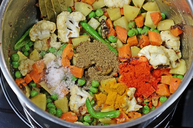 addition of spice powders for hyderabadi veg biryani recipe