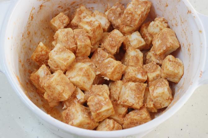 Sprinkling water for binding flour to make paneer 65