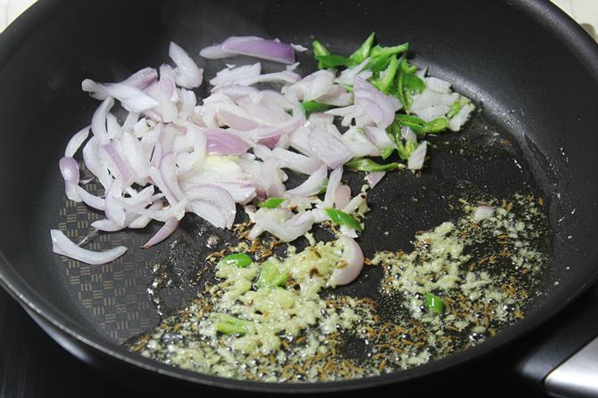 frying ginger onions for making potato sandwich recipe