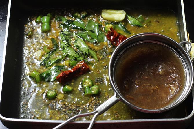 seasoning curry leaves cumin in ghee for palakura pappu