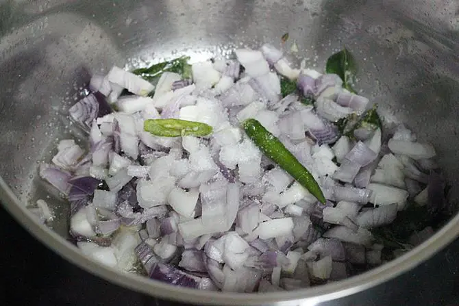 frying onions in pan for sweet potato curry