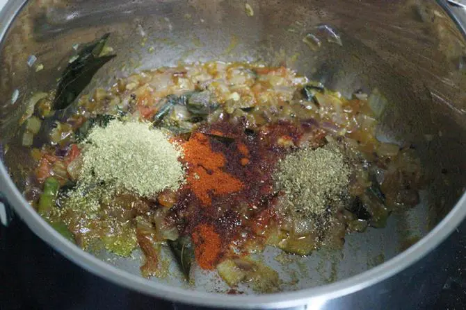 addition of spice powders to pan for sweet potato curry