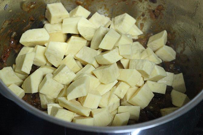 adding cubes veggies for sweet potato curry 