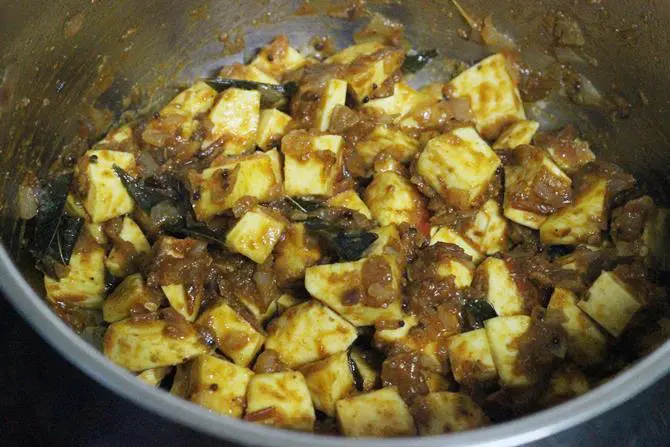 stirring to fry veggies for sweet potato curry