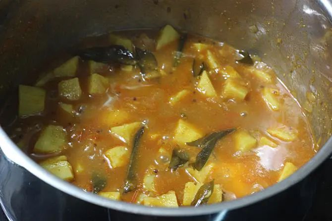 simmer the mixture to make sweet potato curry