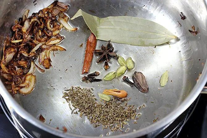 sauteing dry spices for aroma in veg biryani recipe