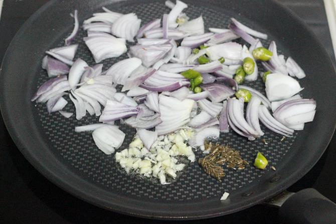 frying spices onions for boiled egg sandwich recipe