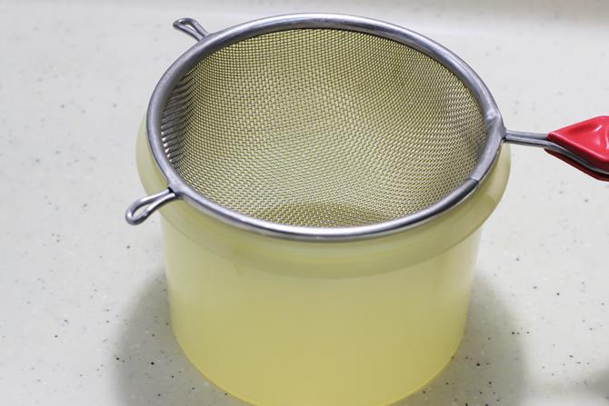 place a colander over a jar