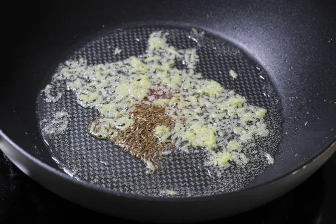 sauteing cumin ginger for baby corn fry recipe