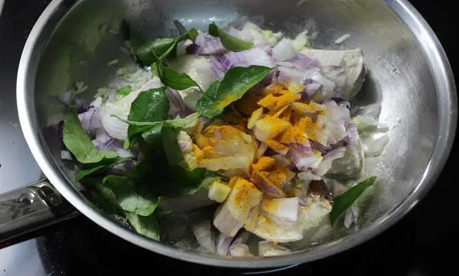 frying onions to make chicken roast