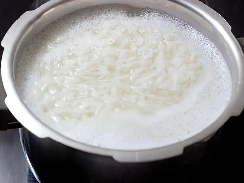cooking basmati rice to make coconut rice