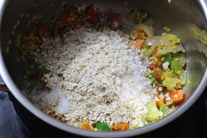 addition of oatmeal salt to make oats khichdi recipe