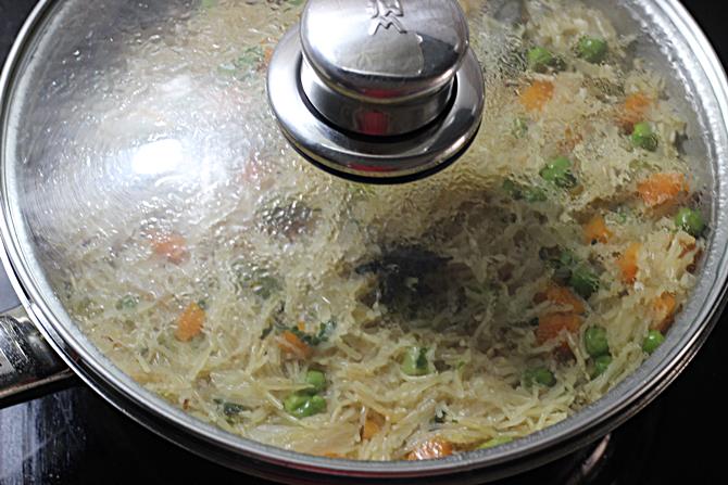 cook pan covered to make spicy vermicelli biryani