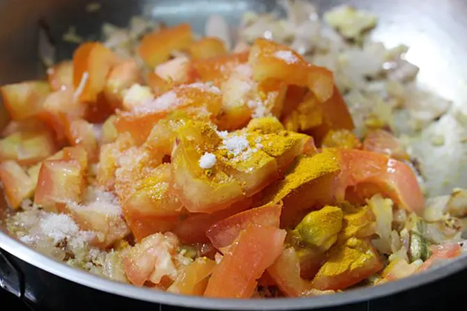 addition of tomatoes for potato egg curry recipe