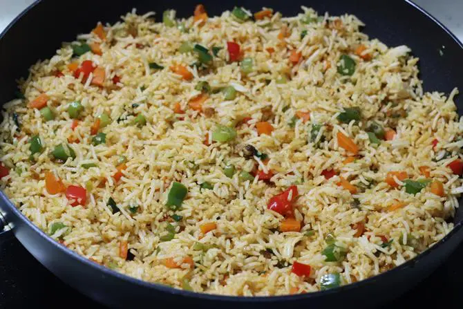 garnished restaurant style schezwan fried rice