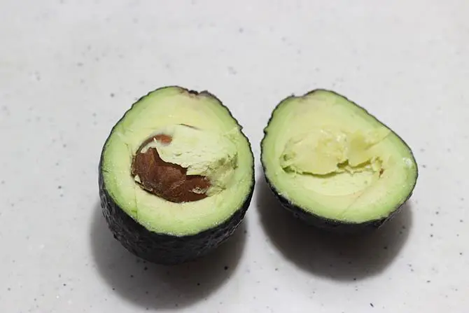 halve the ripe fruit to make avocado dip