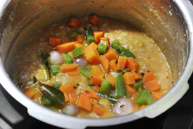 Tempering spices veggies for oats bisi bele bath recipe