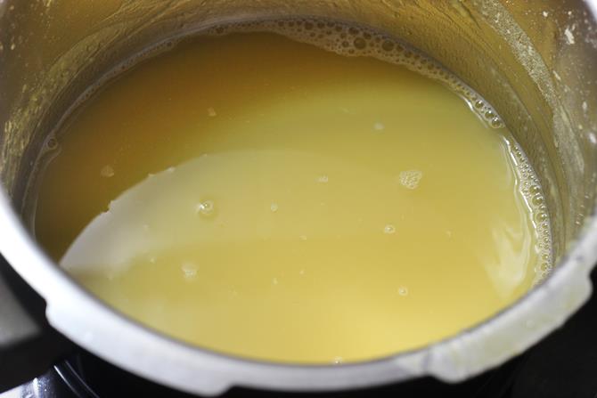 addition of water to pot for cooking sambar oats recipe
