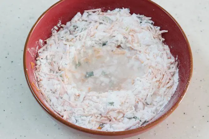 kneading dough to a ball to make akki roti