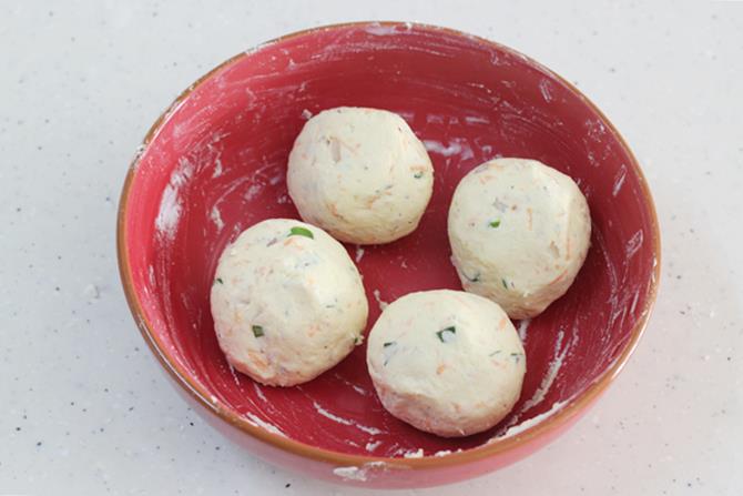 dividing dough to 4 parts to make akki roti