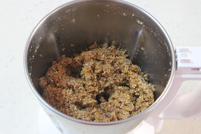 shaping the ground mixture ti dry fruits modak