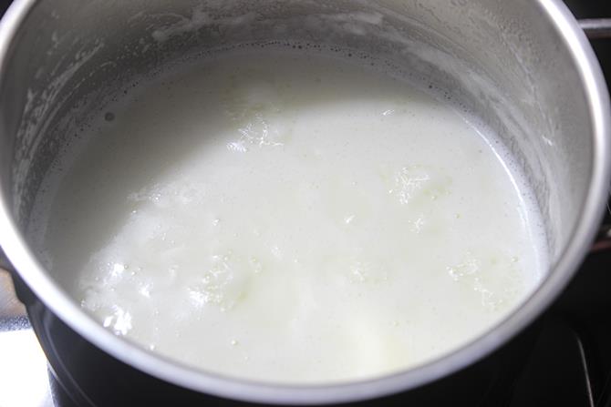 simmering milk to make malai ladoo