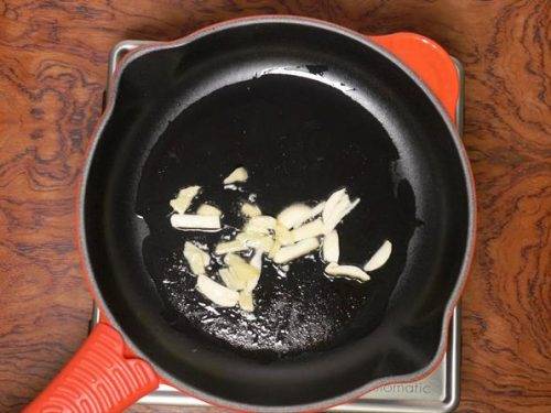 frying ginger garlic to make matar paneer gravy