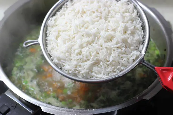 addition of soaked rice for veg pulao recipe