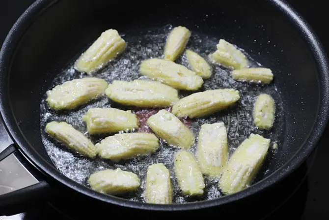 shallow frying baby corn