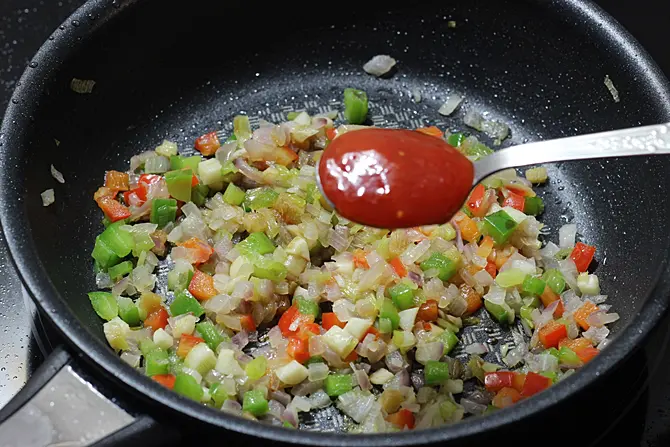 addition of sauces to make baby corn manchurian recipe