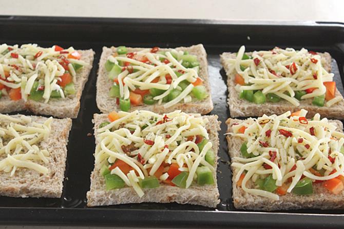 cheese over the bread for capsicum cheese toast