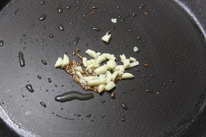 saute cumin, garlic for capsicum cheese toast