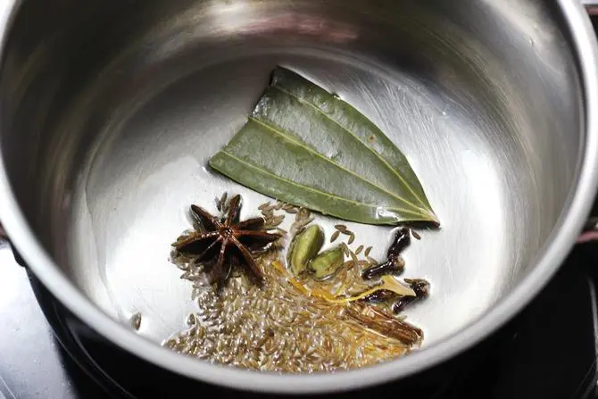 sauteing dry spices in oil for veg kurma recipe