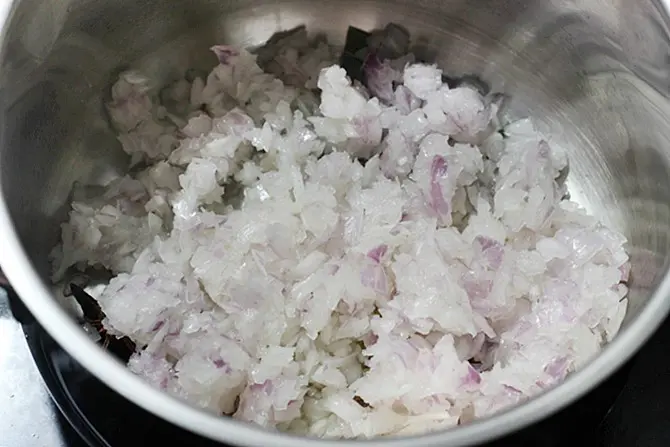 sauteing onions to pink to make vegetable korma recipe
