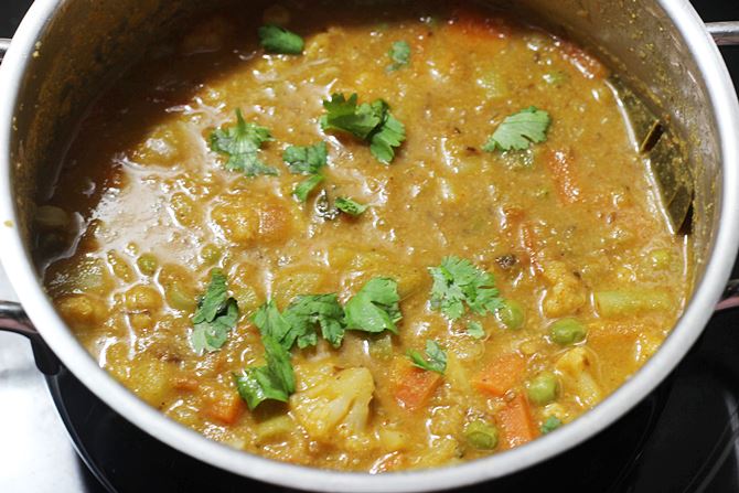 soft cooked veggies in pot for vegetable kurma recipe