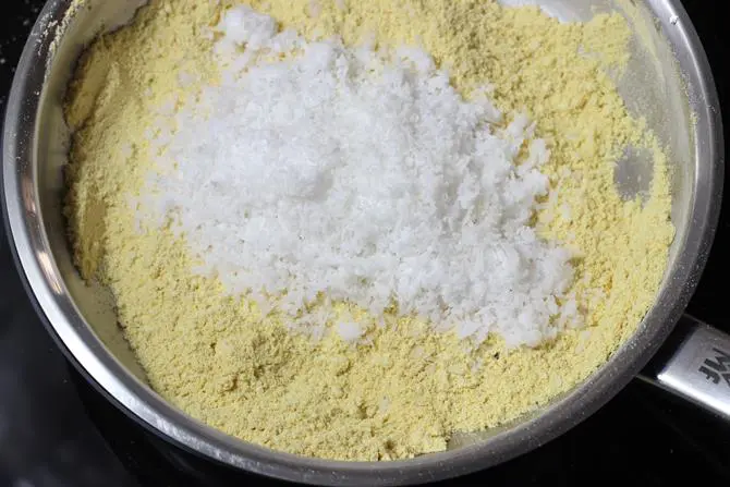 frying coconut to make barfi