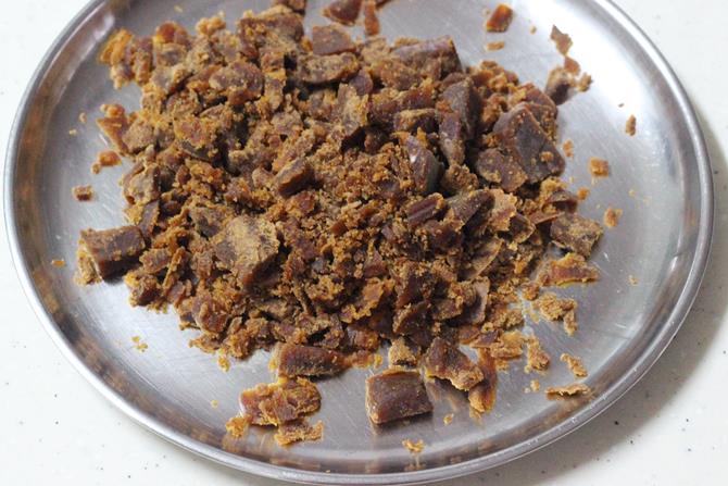 grate jaggery for oats sesame ladoo recipe