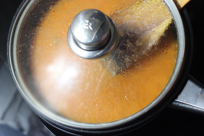 cook covering the pan