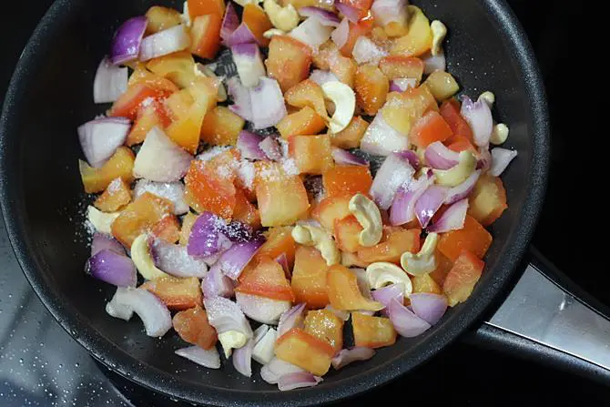 sauteing onions tomatoes for egg butter masala