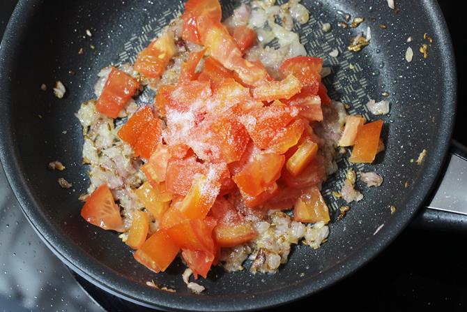 cook tomatoes to make matar mushroom recipe