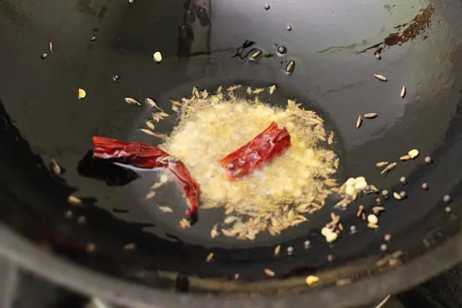 tempering mustard cumin for steamed cabbage curry