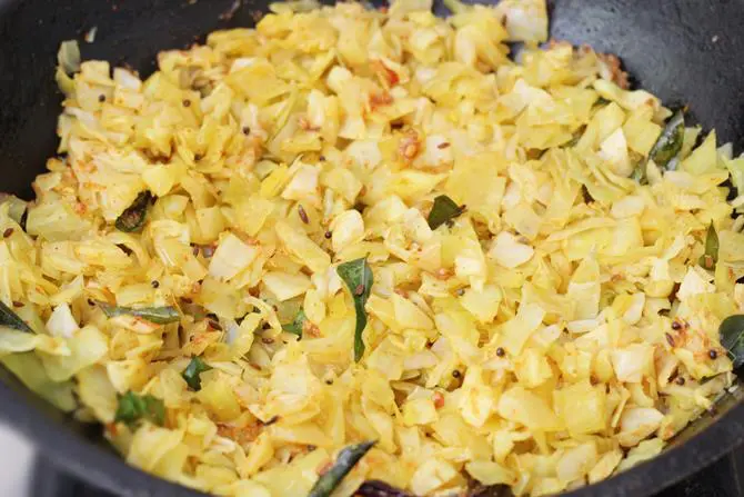 frying steamed cabbage for curry