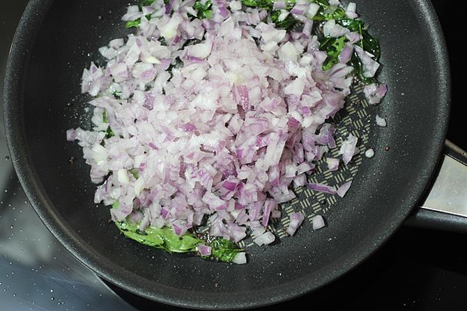 frying onions to make chettinad egg curry