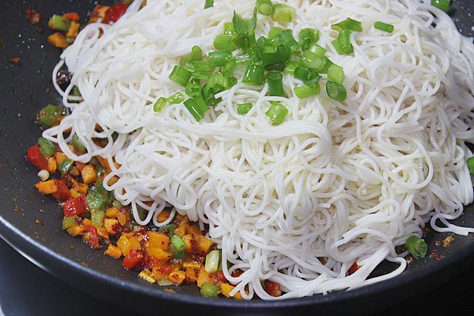 addition of noodles to sauce