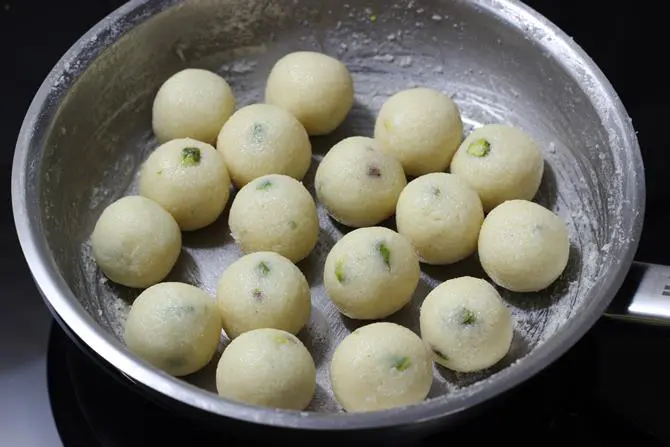 rolling mixture to coconut balls