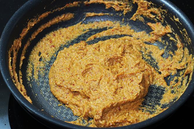 frying the spice blends with puree