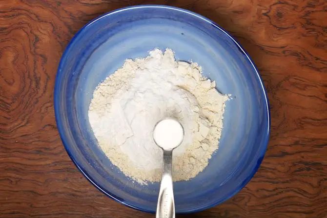 adding soda to flour to make mysore bonda